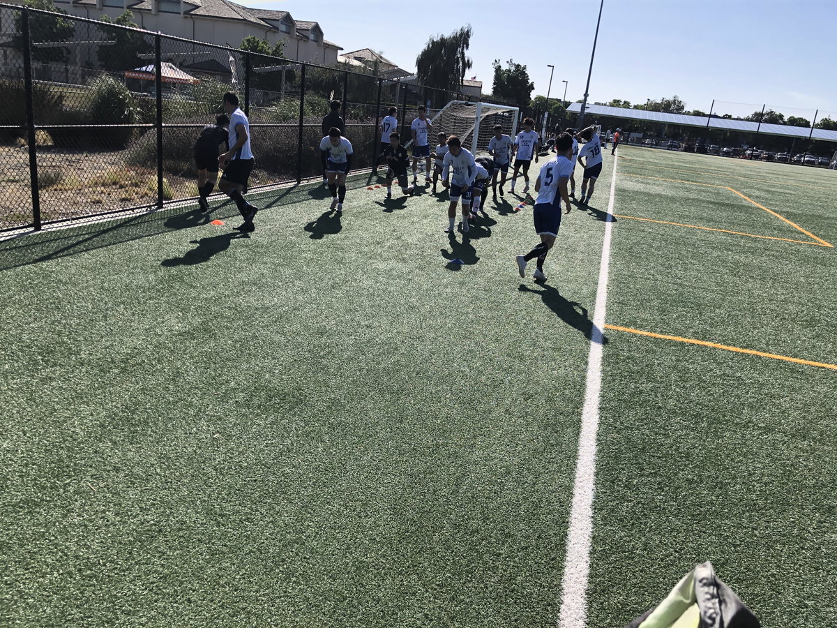 CalBlue team preparing beside the field